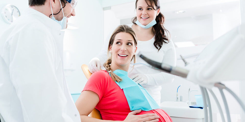 pregnant woman at the dentists office